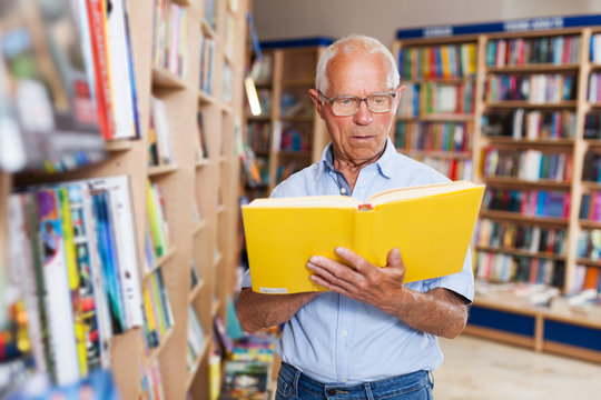 Man Reading New Books