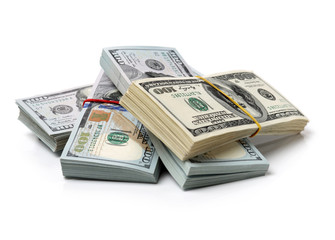 Many bundle of US 100 dollars bank notes isolated on white background 
