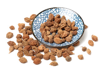 Seeds of black cardamom isolated on white background