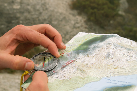 Orienteering with topographic map and compass