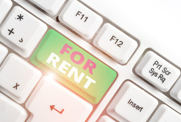 Word writing text For Rent. Business photo showcasing when you make property available for purchasing temporarily White pc keyboard with empty note paper above white background key copy space