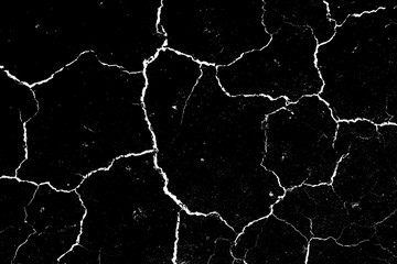 dried and cracked ground. erosion earth black and white cracked texture