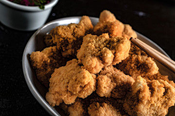 Delicious crispy fried chicken breast strips.
