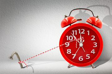 Stop time on clock by rope and nail.Business management and control for period and break overtime...