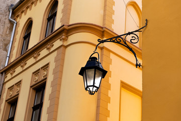 Fototapeta na wymiar lantern on a yellow building