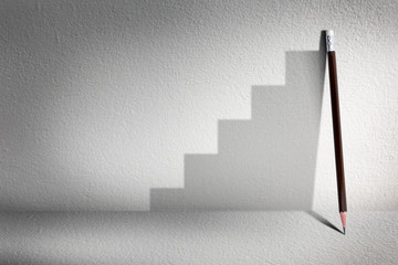 Stairs with pencil for effort and challenge in business to be achievement and successful concept