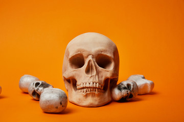 skulls on orange background, Halloween decoration