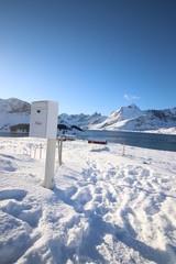 White Mail box on Coast of the Norwegian Sea in the Arctic Ocean.