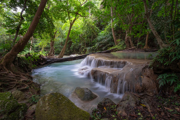 Erawan waterfall in the forest .