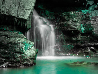 Naklejka premium Zmeykovsky waterfall in the mountain forest. Sochi.