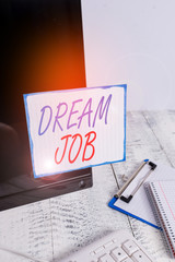 Writing note showing Dream Job. Business concept for An act that is paid of by salary and giving you hapiness Note paper taped to black computer screen near keyboard and stationary