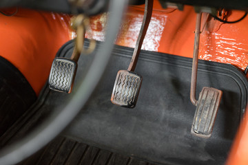 Close up at pick-up truck step controlling plate such as accelerator, brake or gearing clutch....