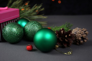 Christmas decorations for Christmas tree, gift, cones, Holly berries. The concept of celebrating...