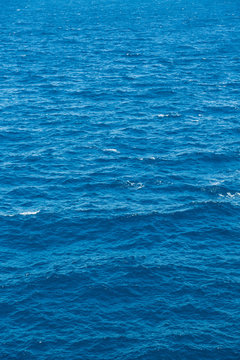 Abstract blue water sea for background or texture, vertical