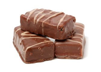 Chocolate peanut candy on white background