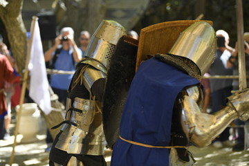 Knights are fighting on the battlefield during the festival 