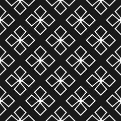 Seamless vintage pattern with geometric crosses. Black and white background.