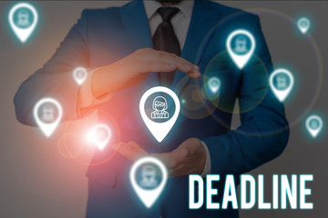 Word writing text Deadline. Business photo showcasing Period of time by which something must be finished or accomplished Male human wear formal work suit presenting presentation using smart device