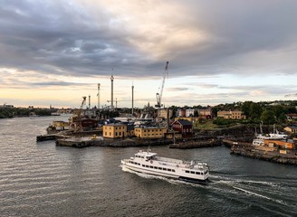 Fototapeta premium View from the water to the park of attractions in Stockholm