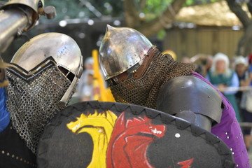 Knights are fighting on the battlefield during the festival 