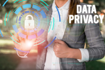 Text sign showing Data Privacy. Business photo showcasing protection of sensitive data from unrelated third parties Female human wear formal work suit presenting presentation use smart device