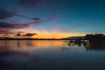 Naklejka na ściany i meble magical sunset in mekong river