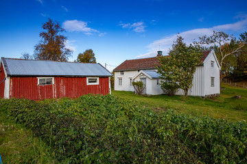 Fototapeta na wymiar Old farmhouse on Sør Kvaløya in Sømna municipality, Northern Norway