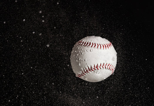 Baseball Ball Flying In The Rain.