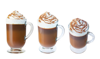 Coffee, cappuccino with whipped cream in a glass, Irish glass. Ground cinnamon. Isolate on a white background. The photo.