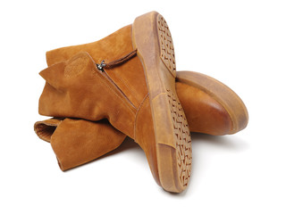 Women leather brown boots on white background