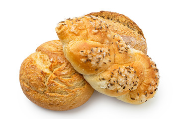 Three white bread rolls isolated on white. Round rustic, plaited with salt and caraway seeds and french.