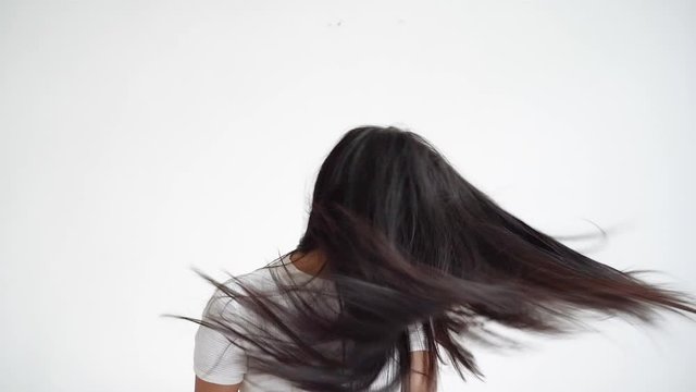 4k slow motion , Asian woman is shaking her hair.