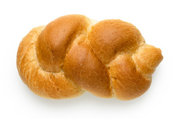 Plaited plain white bread roll isolated on white. Top view.