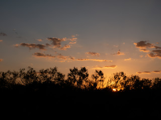 Clouds Hang in Orange Red Sky