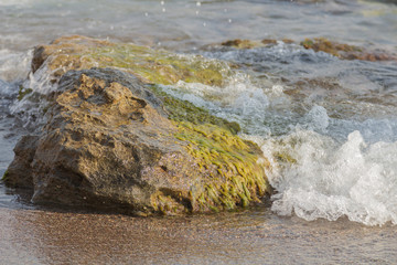 Stein in der Brandung
