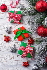 Gift boxes, candy cane and tree