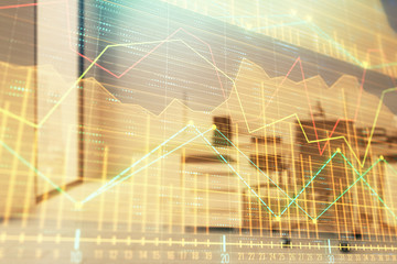 Stock market chart with trading desk bank office interior on background. Double exposure. Concept of financial analysis
