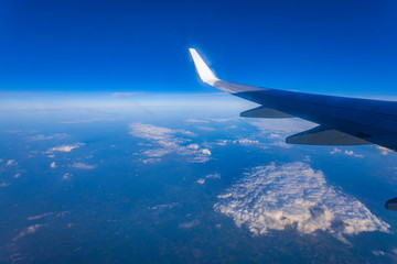 Fototapeta na wymiar Flugzeug - Über den Wolken (Luftaufnahme)