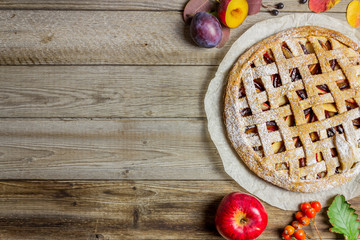 Plum apple pie. Cooking. Recipes. Vegetarian food.