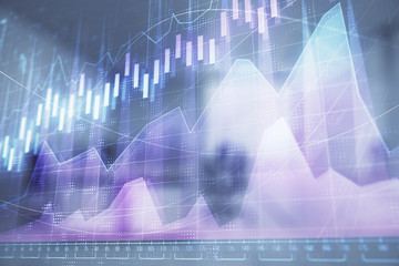 Stock market chart with trading desk bank office interior on background. Double exposure. Concept of financial analysis
