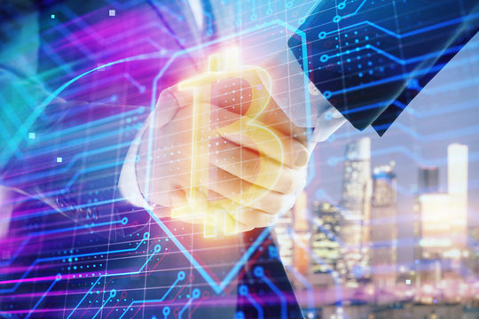 Double exposure of crypto economy theme drawing on cityscape background with handshake. Concept of partnership and blockchain