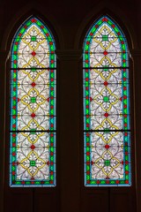 Colorful of stained glass window in roman catholic church close up