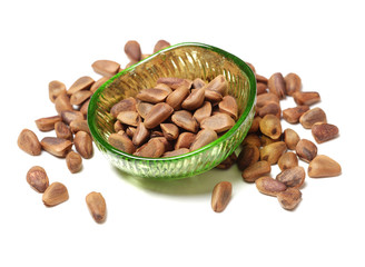 Pine nuts on white background