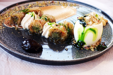 baklawa sweet dessert. traditional turkish pastry on a rustic table