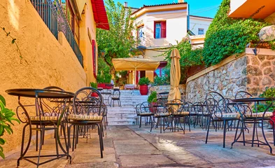 Gardinen Straßencafé im Stadtteil Plaka in Athen © Roman Sigaev