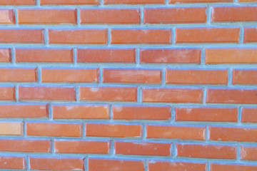 Brick red wall, masonry wall close up