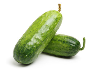 Green cucumber on the white background