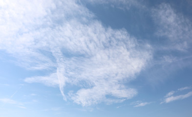 white clouds on light blue sky by wide angle lens
