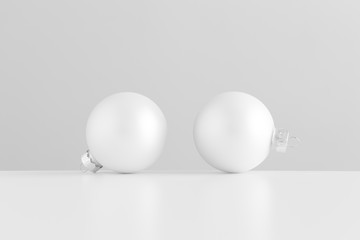 Two white matte christmas balls.