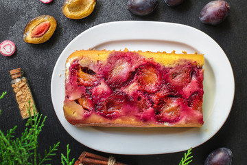 plum pie (delicious dessert, pastries with fruit) menu concept. food background. copy space. Top viev